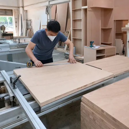 Interior joinery contractor using 18mm blockboard for built-in furniture and fit-out work