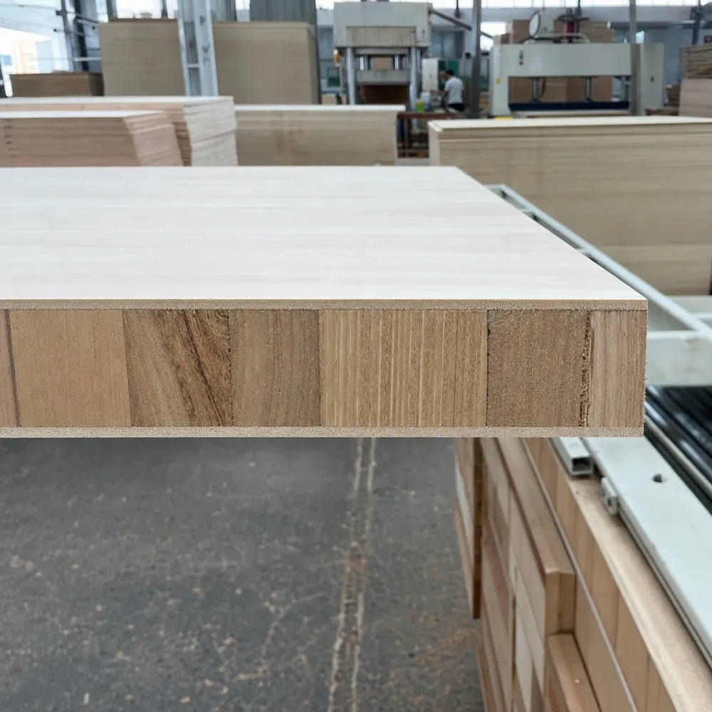 Blockboard cabinet board cross-section showing solid wood strip core and veneer layers — QDPlywood.com factory production