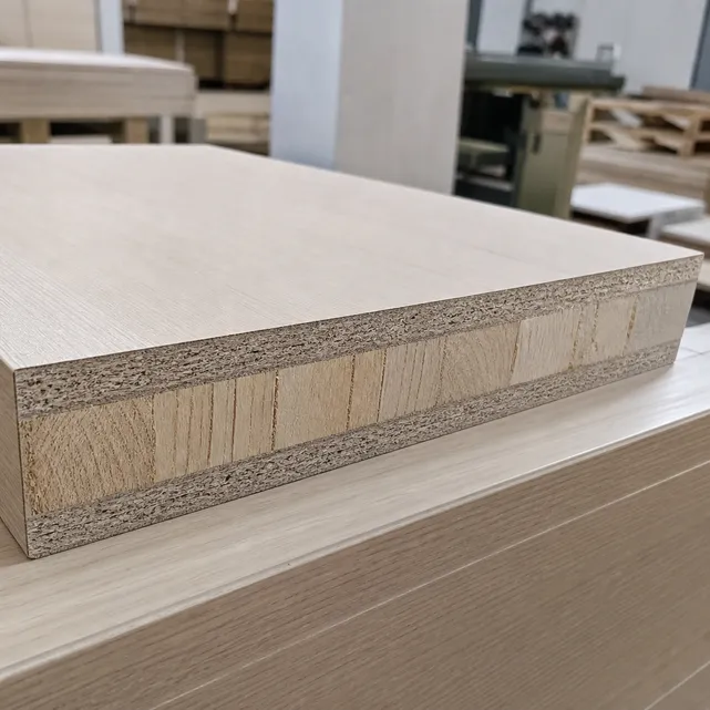 Cross-section of blockboard cabinet panel showing poplar core strips and cross-grain veneer layers
