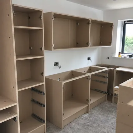 Blockboard used as kitchen cabinet carcass panels in a fitted kitchen installation