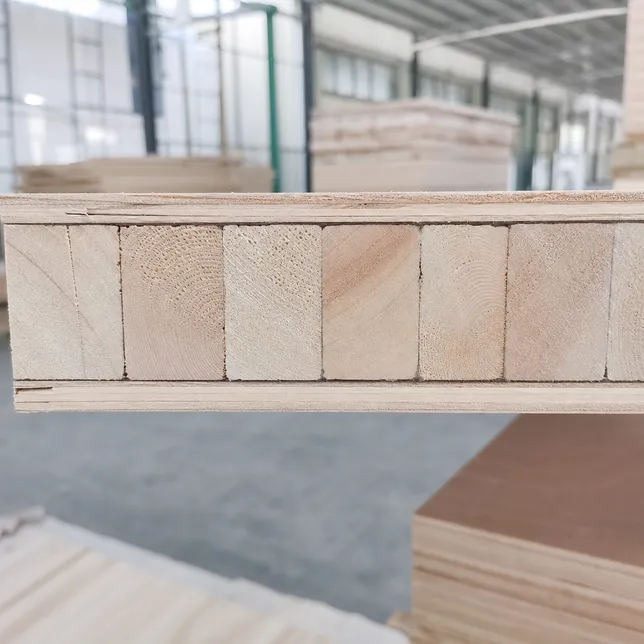 Cross-section of blockboard showing solid wood core strips, face veneers, and glue lines