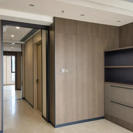 HPL-faced laminate blockboard installed in commercial interior fit-out — wall paneling and partition systems