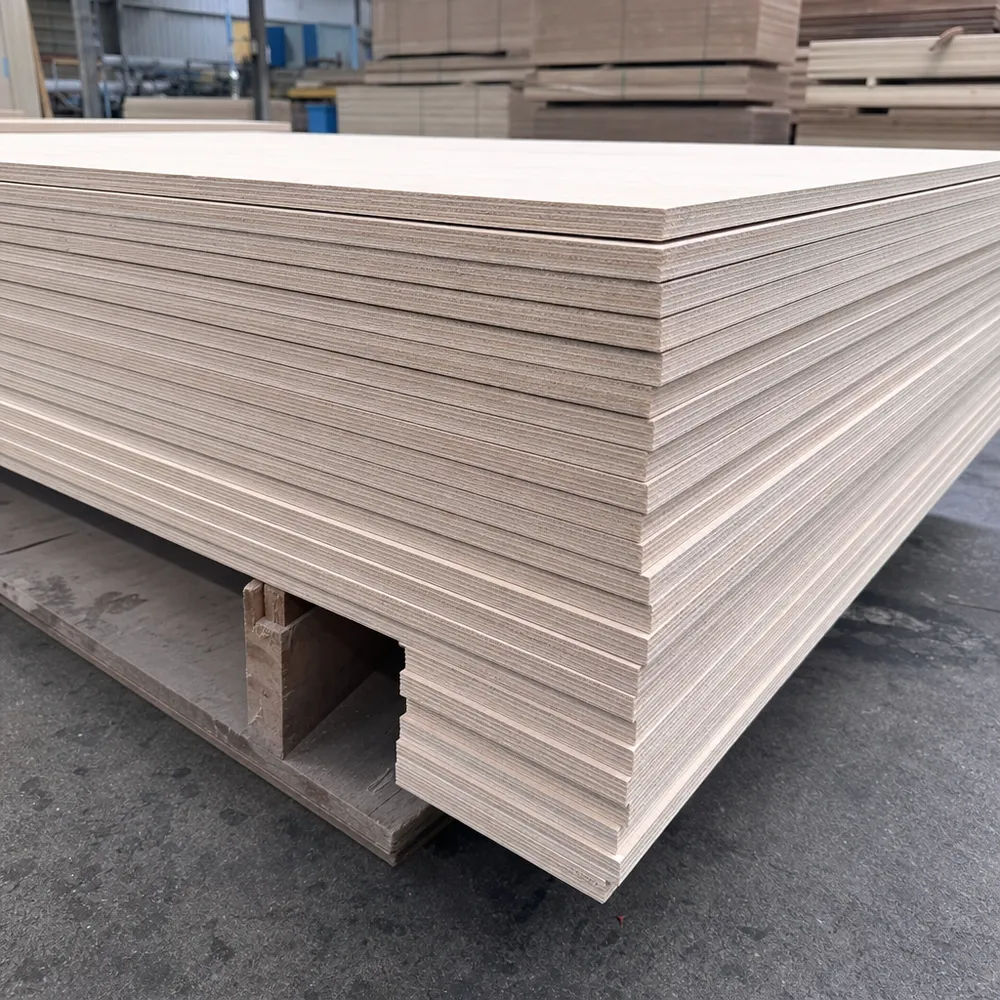 8mm plywood panels stacked at QDPlywood factory, showing 5-ply cross-laminated construction