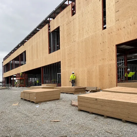 Exterior plywood structural sheathing on commercial construction site