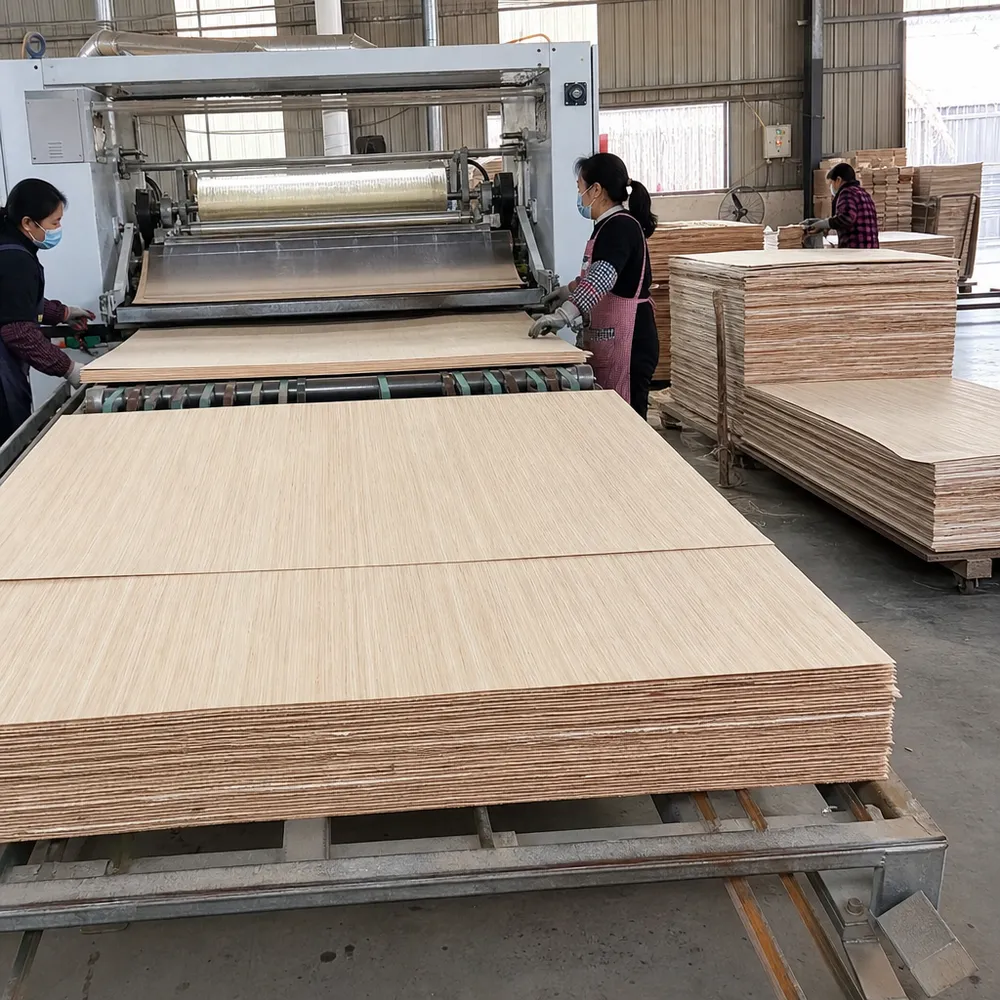 Automated glue spreading and veneer layup for furniture plywood