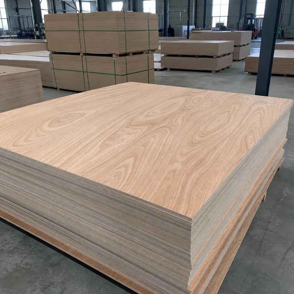 Hardwood plywood panels with visible veneer face grain, stacked for export at QDPlywood factory in Xuzhou, China