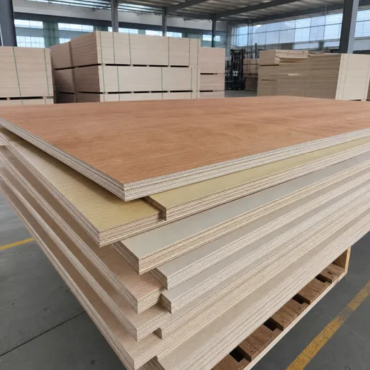 Commercial plywood panels stacked showing cross-section layers and face veneer grades