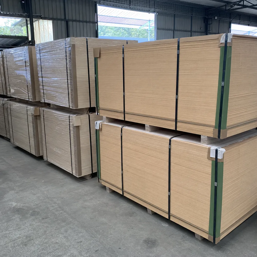 Interior plywood bundles strapped and edge-protected with corner boards ready for container loading