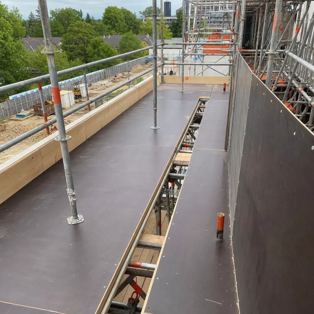 Birch film faced plywood used as scaffold platform boards on construction scaffolding