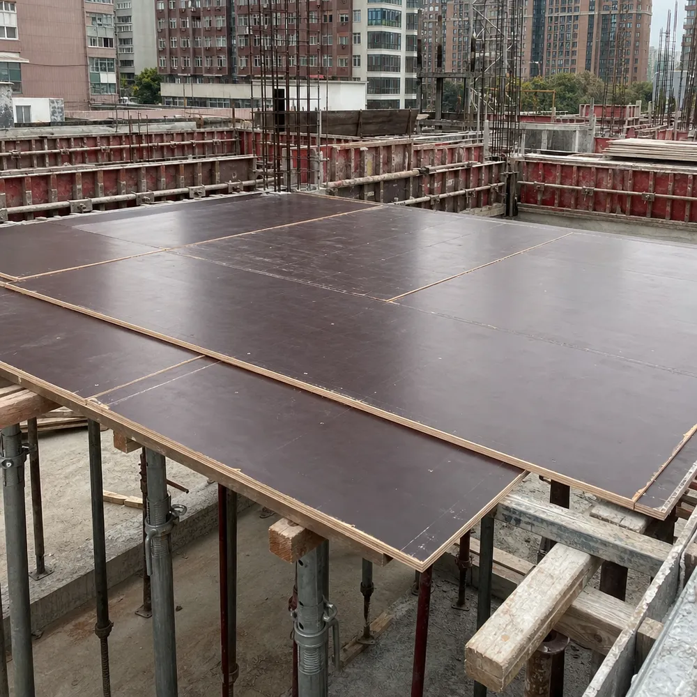 Birch film faced plywood used as slab deck formwork supported by props
