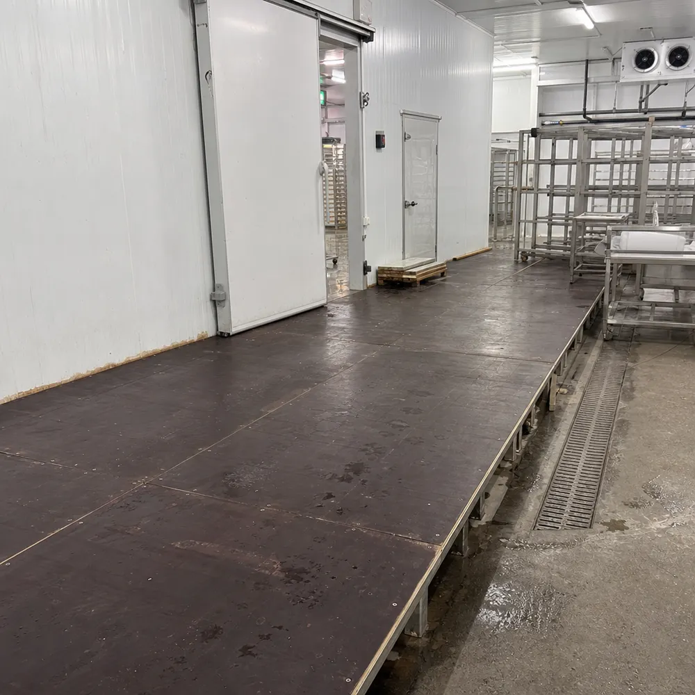 Marine film faced plywood as flooring substrate in cold storage and food processing facilities