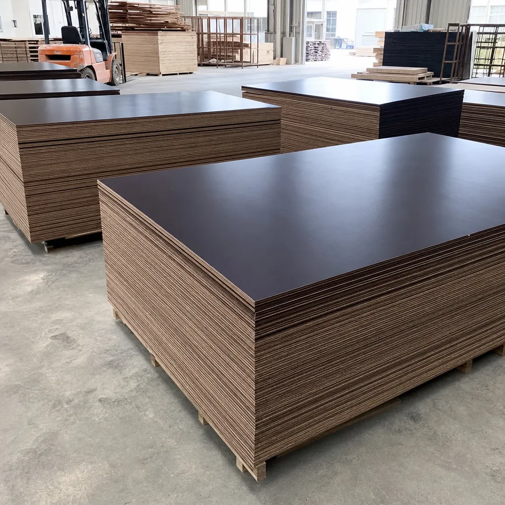Shuttering film faced plywood panels stacked at QDPlywood factory — phenolic film surface, WBP-bonded hardwood core