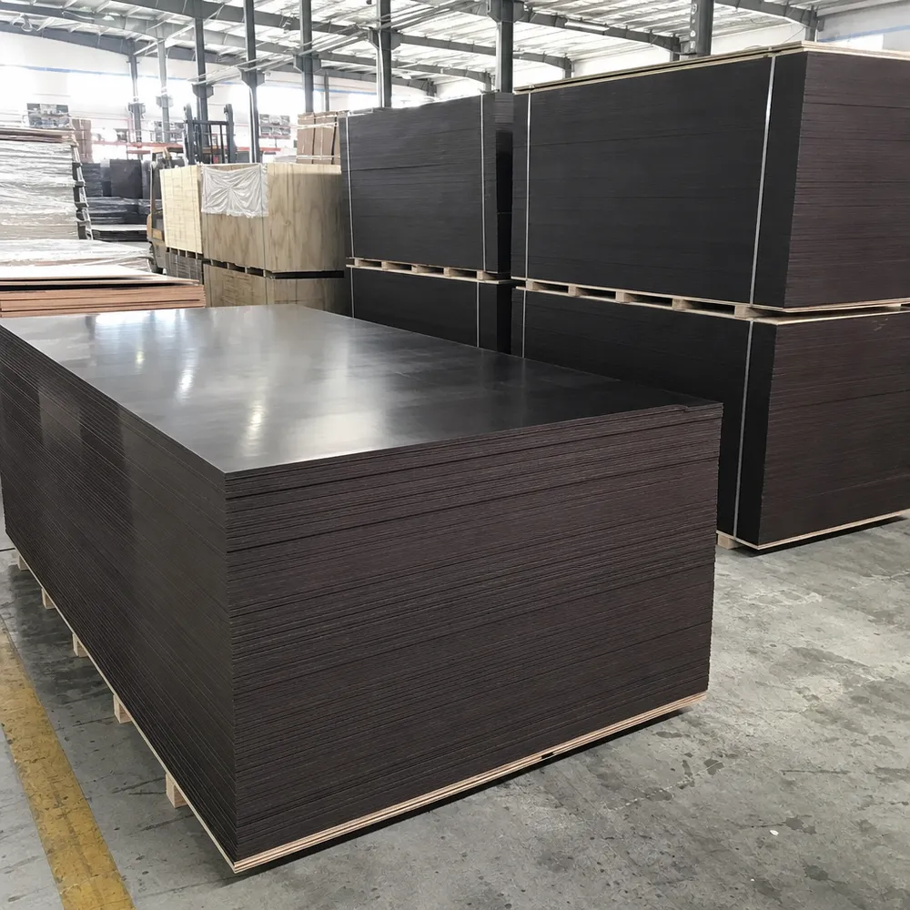 Structural film faced plywood panels stacked at QDPlywood Xuzhou factory — engineered for defined load-bearing performance