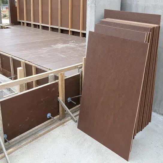 Tempered masonite hardboard panels used in concrete forming and construction