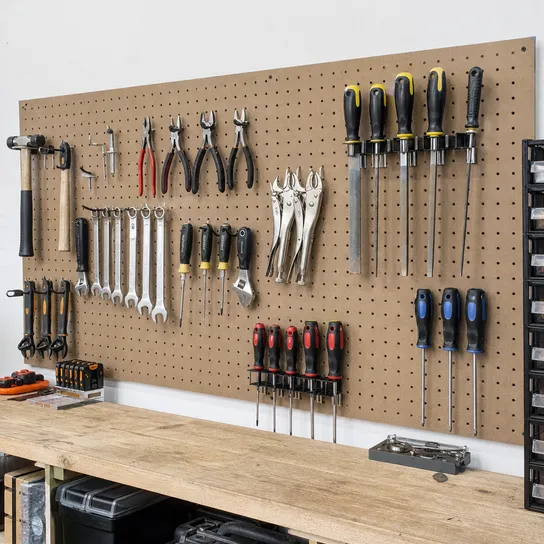 Tempered masonite hardboard used for pegboard and tool storage wall panels