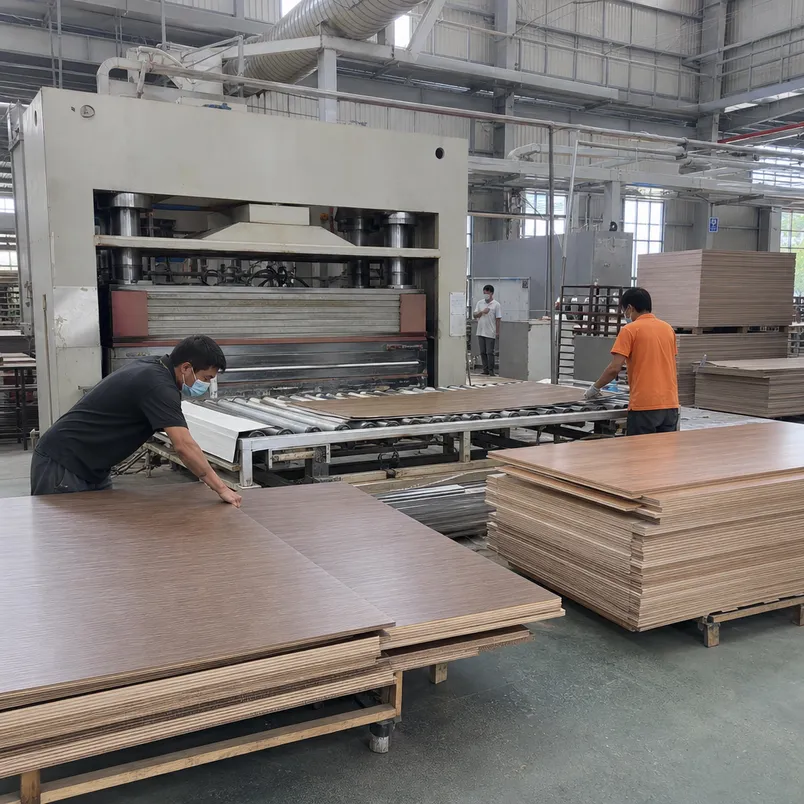 Custom HPL plywood production line showing laminate pressing and panel finishing at QDPlywood factory