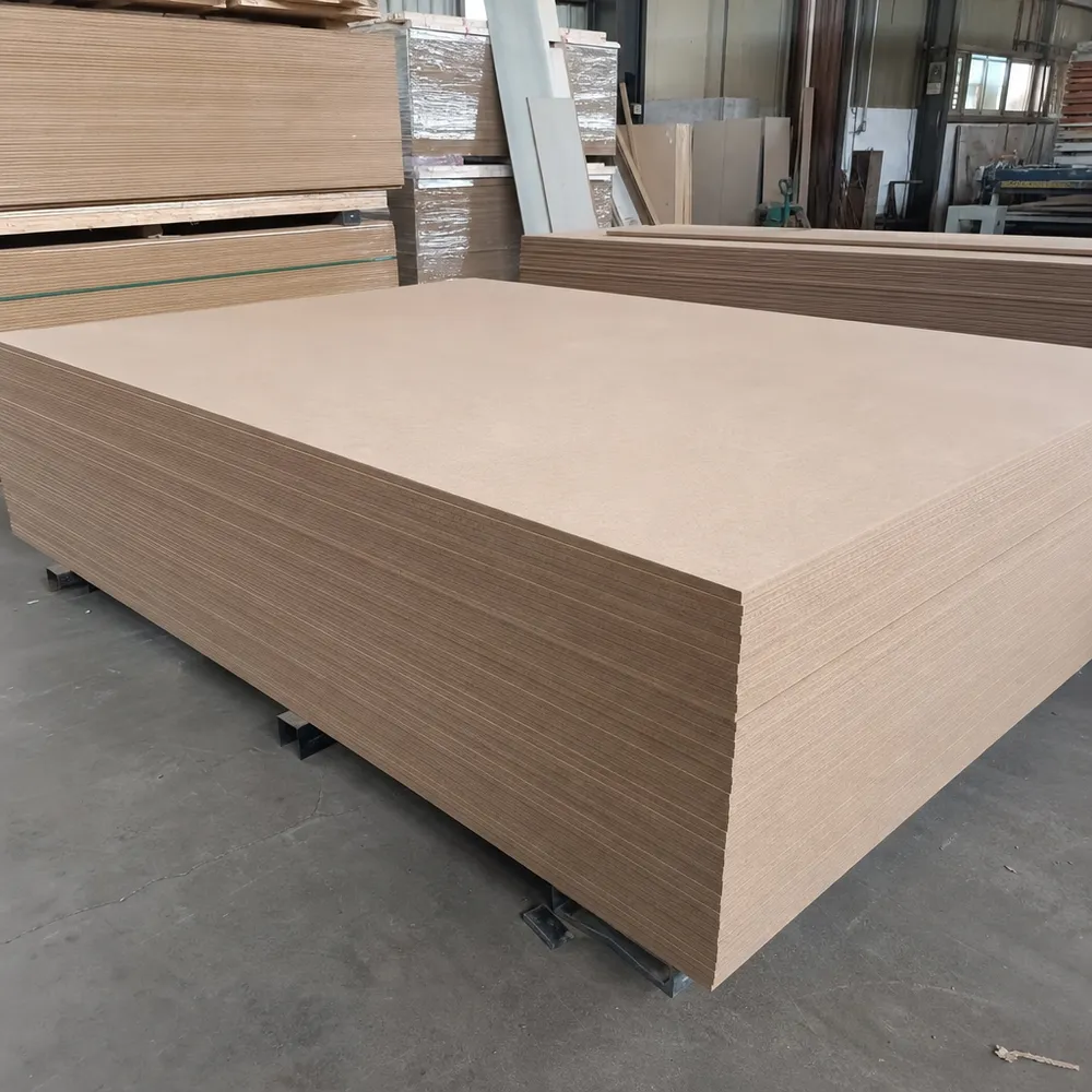 CNC MDF board sheets stacked at QDPlywood factory, showing consistent sanded surface finish