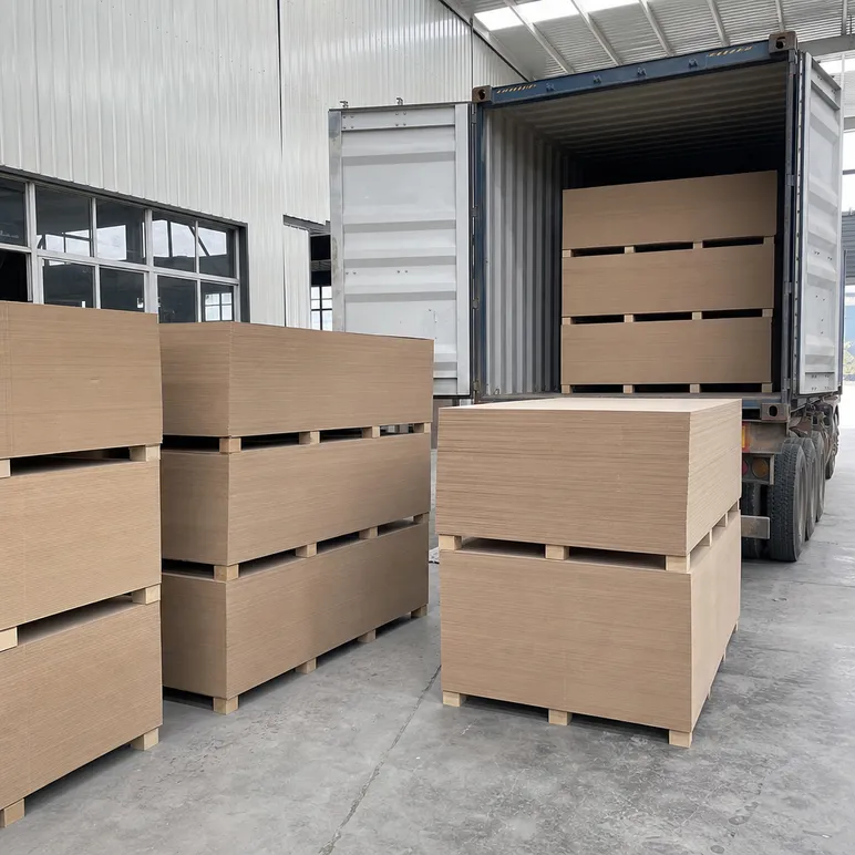 CNC MDF sheets stacked and ready for container loading, showing standard 1220x2440mm panel format