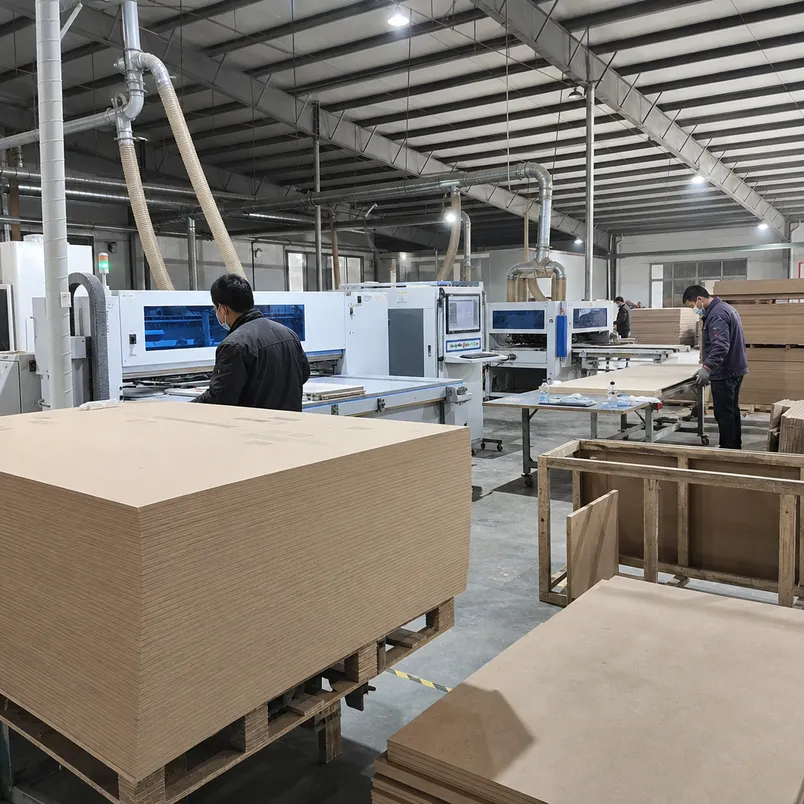 CNC MDF production floor at Xuzhou QD Wood Industry — factory-direct supply for B2B buyers