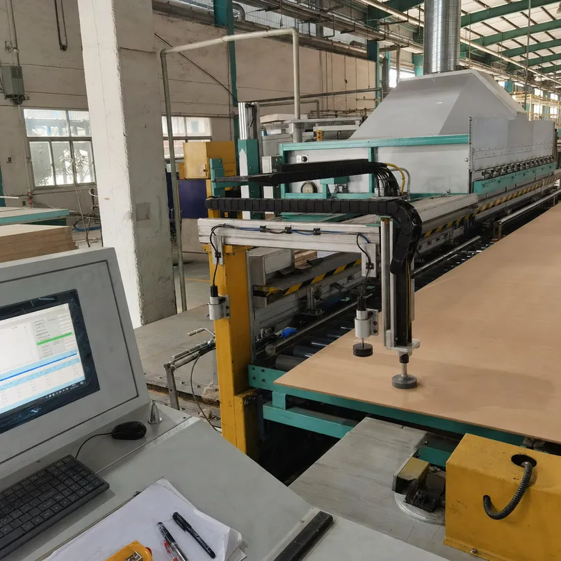 HDF continuous press line showing high-pressure panel production with density monitoring equipment