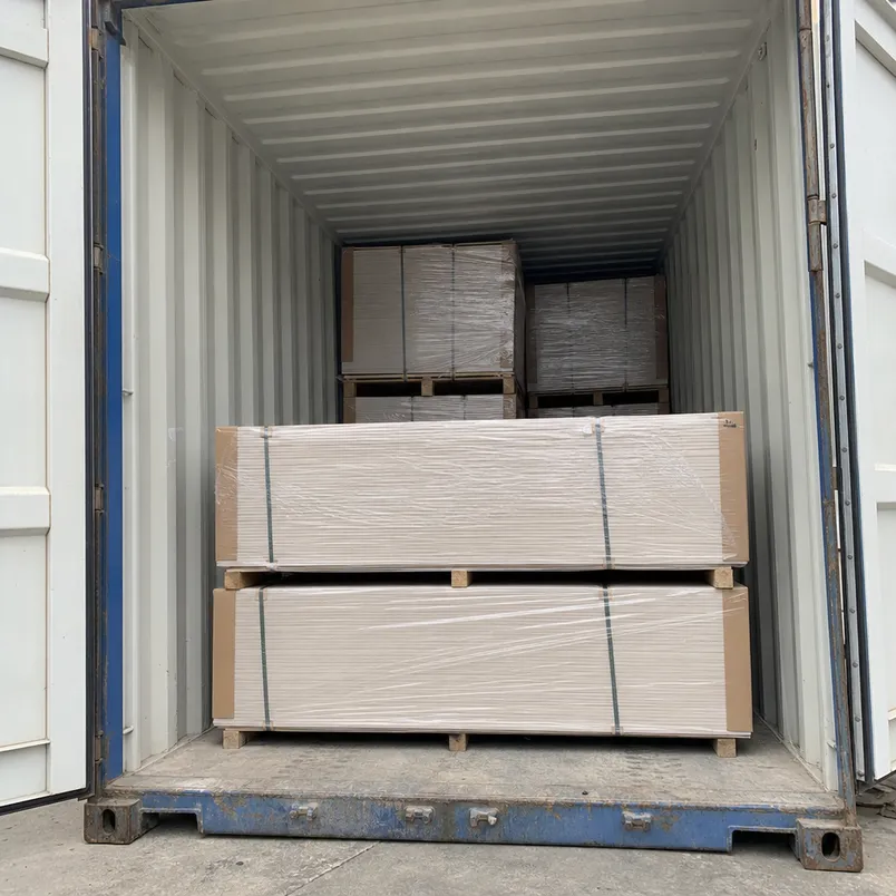 Bundled 18mm melamine MDF panels loaded in a 40HQ shipping container, showing moisture-resistant wrapping and corner board protection