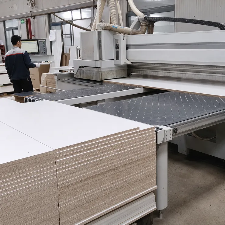 CNC cutting line processing melamine MDF panels for flat-pack furniture production