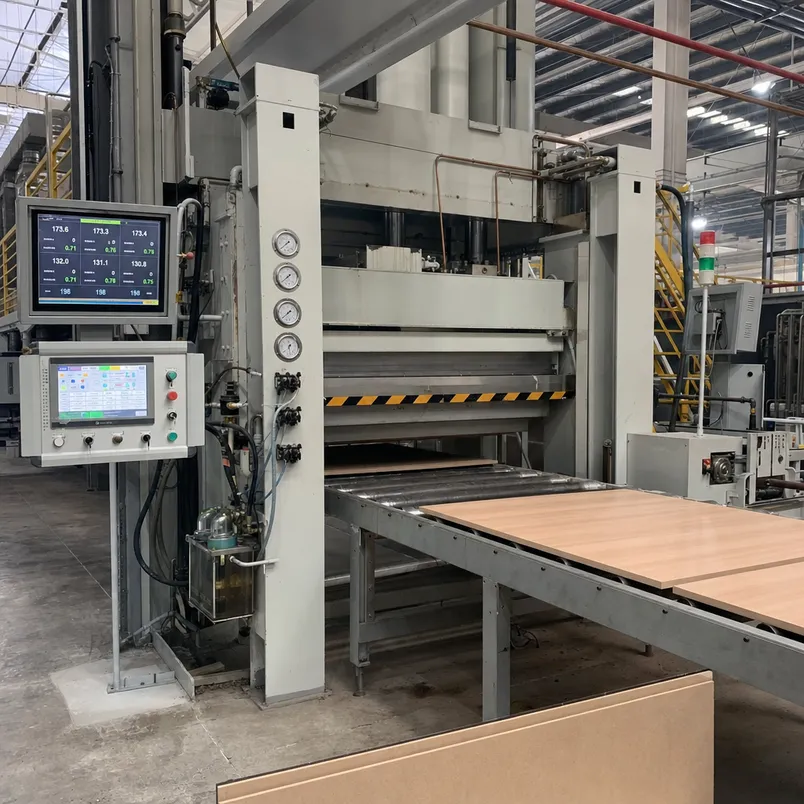Melamine MDF hot press production line showing temperature and pressure monitoring