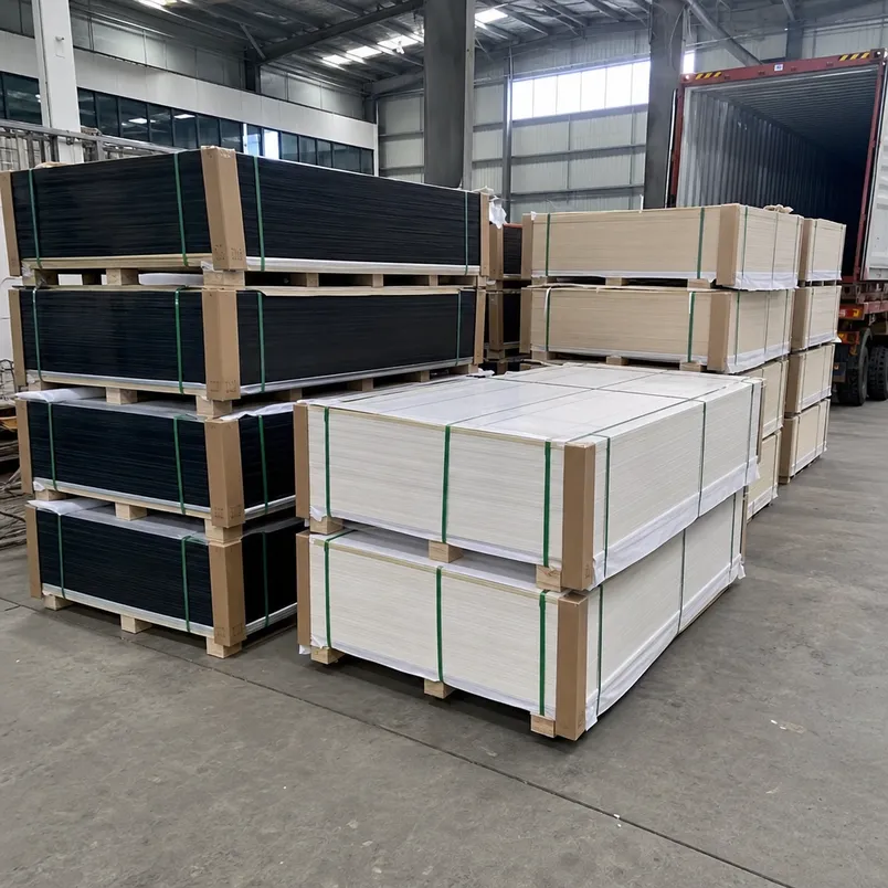 Glossy melamine plywood bundles with interleaved protective paper and corner boards ready for container loading