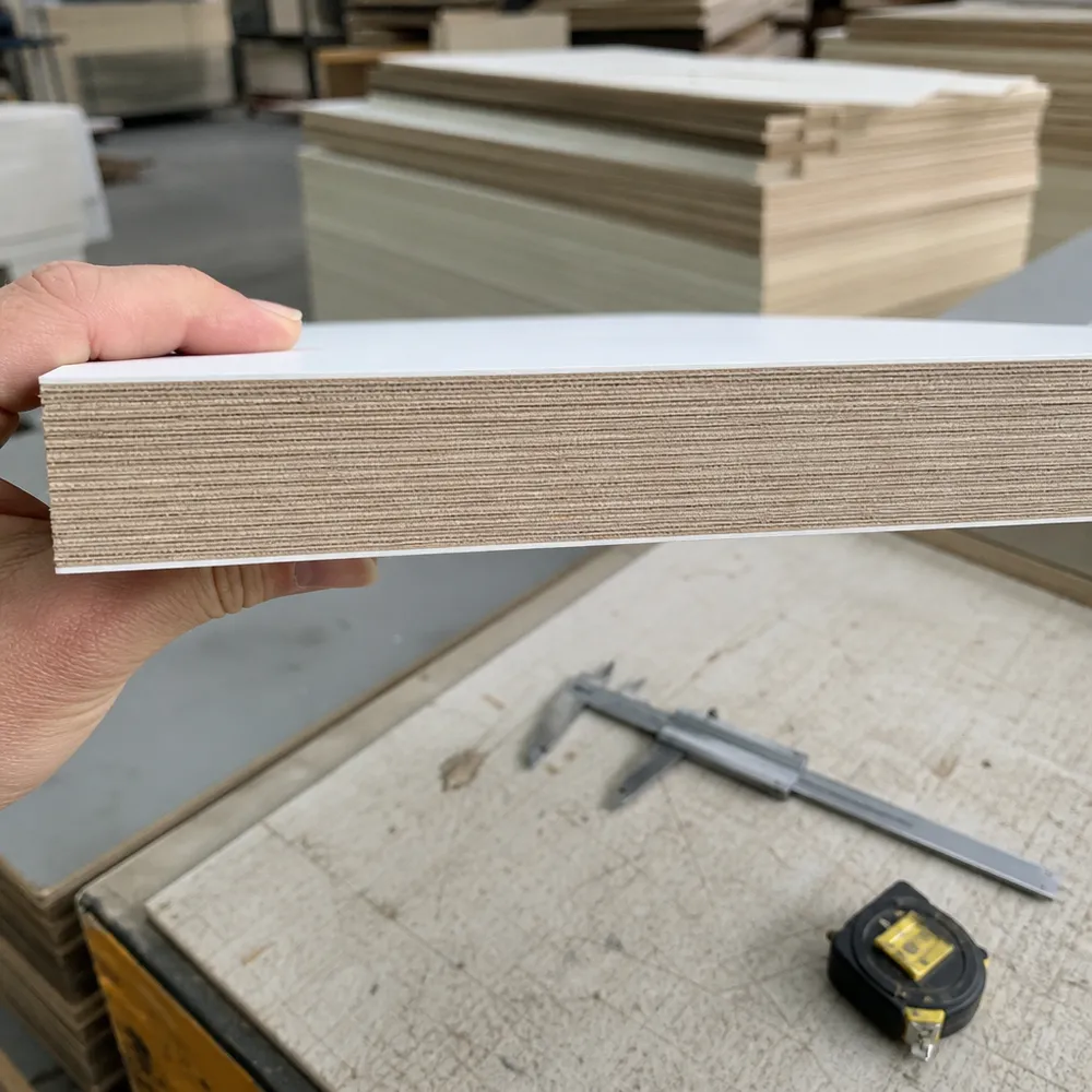 Cross-section of cabinet-grade melamine board showing dense-layup core veneer construction with tight void specification
