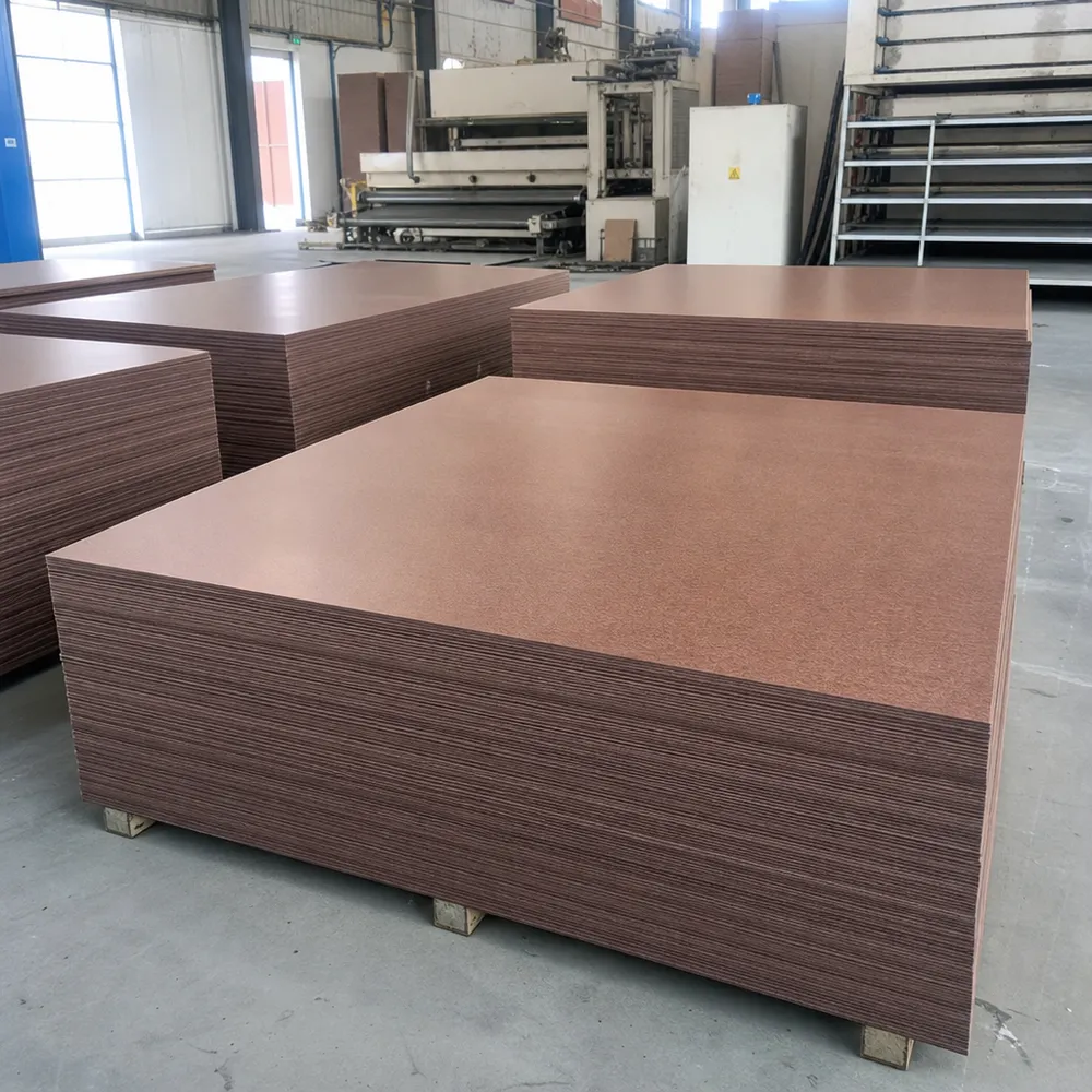 MDO plywood panels with smooth resin-impregnated paper overlay surface, stacked at QDPlywood manufacturing facility