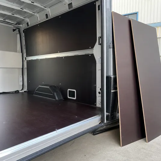 Paper overlaid plywood sheet used as trailer floor and vehicle interior lining panels