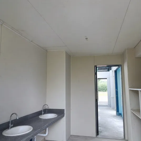 Paper overlaid plywood sheet installed as interior wall and ceiling panels