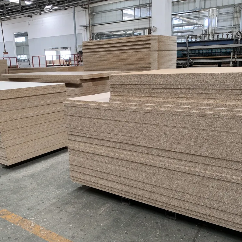 Factory-direct chipboard particle board panels stacked in production facility — P2 and P5 grades