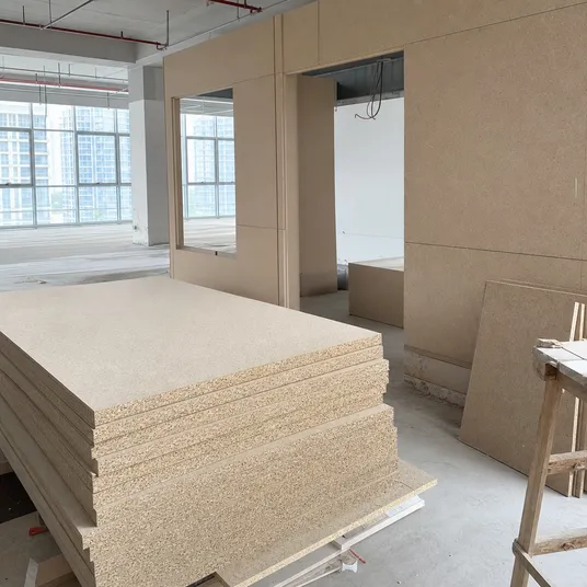 Chipboard particle board panels used in commercial interior fit-out and partitioning