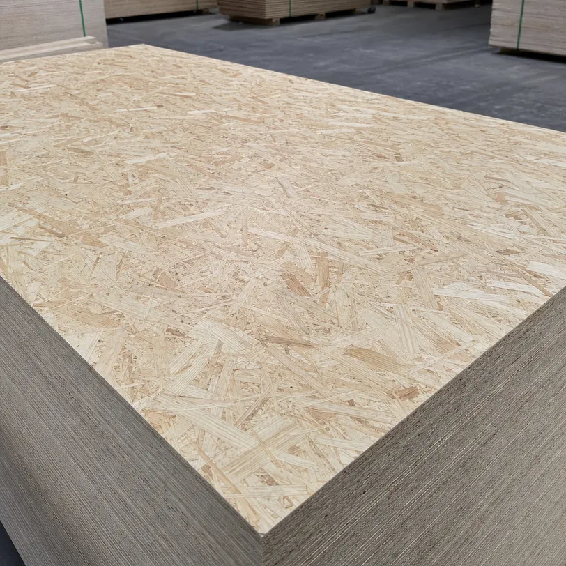 Oriented strand board structural panel — cross-oriented strand layers for wall sheathing and roof decking
