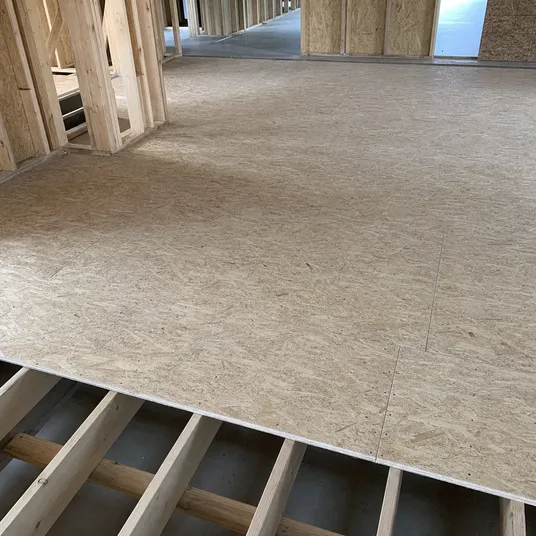 OSB flooring panels installed as residential subfloor over floor joists