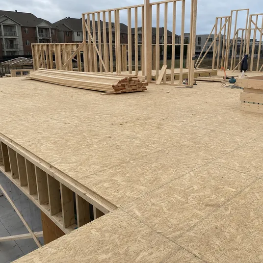 OSB flooring panels used as platform deck in timber frame construction