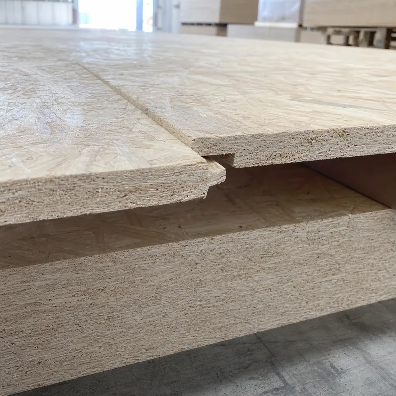 Tongue-and-groove edge profile on OSB subfloor panel showing interlocking joint detail